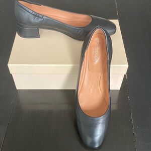 Black leather, ballet style shoe.